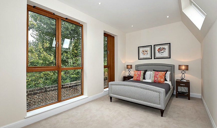 This stunning new build London property for sale has spacious rooms and large, casement windows which let in abundant natural light