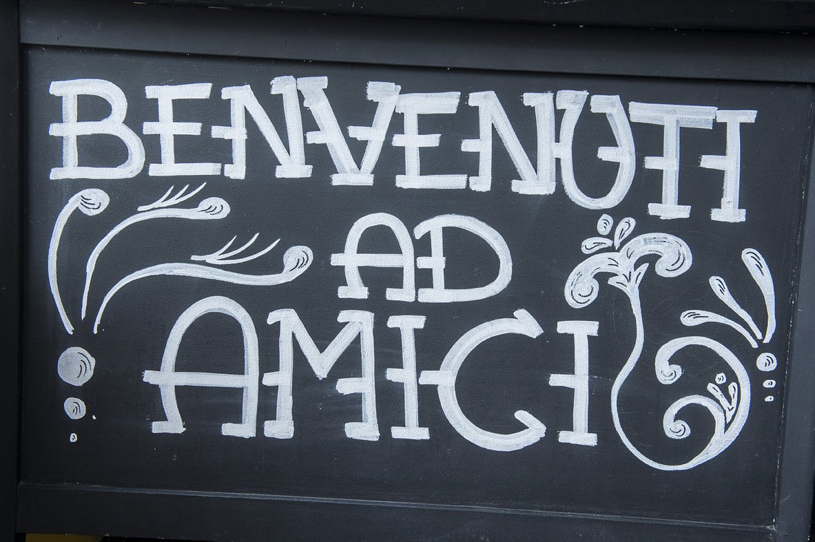 amici welcome sign - Daniel Cobb - Locally grown